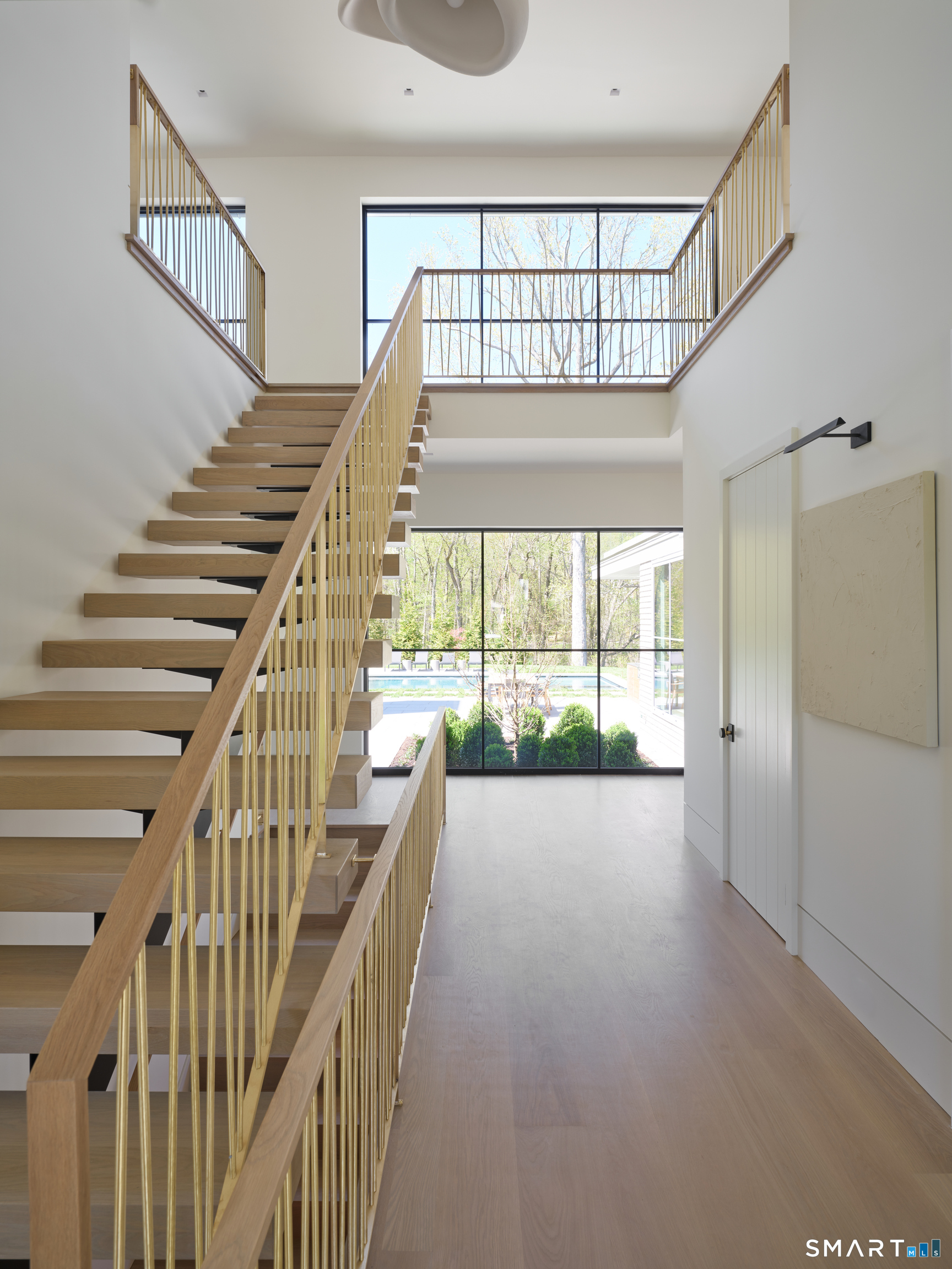 45 Old Farm Road Darien, CT 06820 - Photo 17 of 38 a view of an entryway with staircase
