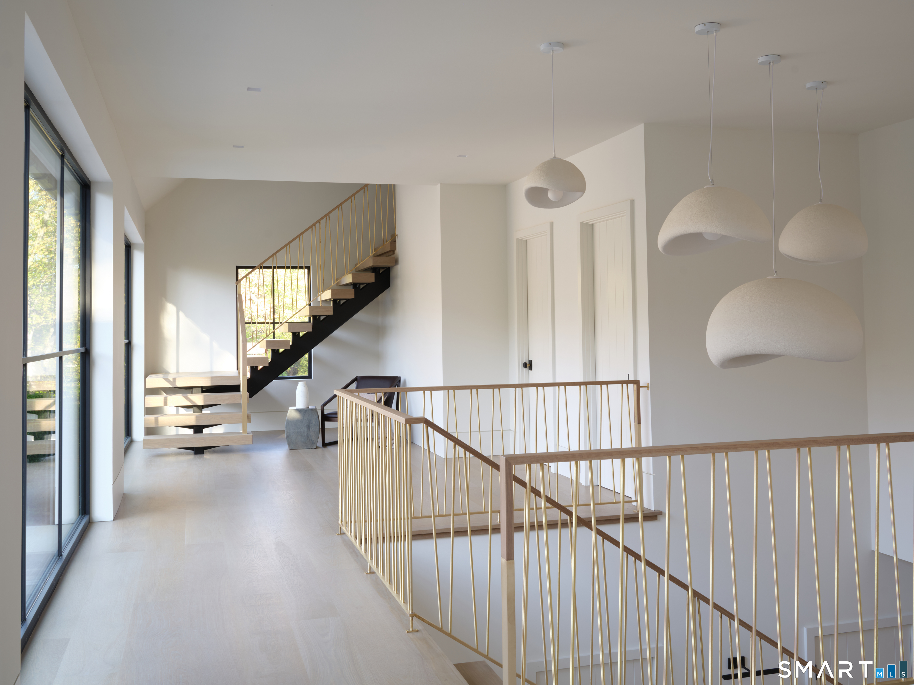 45 Old Farm Road Darien, CT 06820 - Photo 18 of 38 a view of entryway and hall with wooden floor