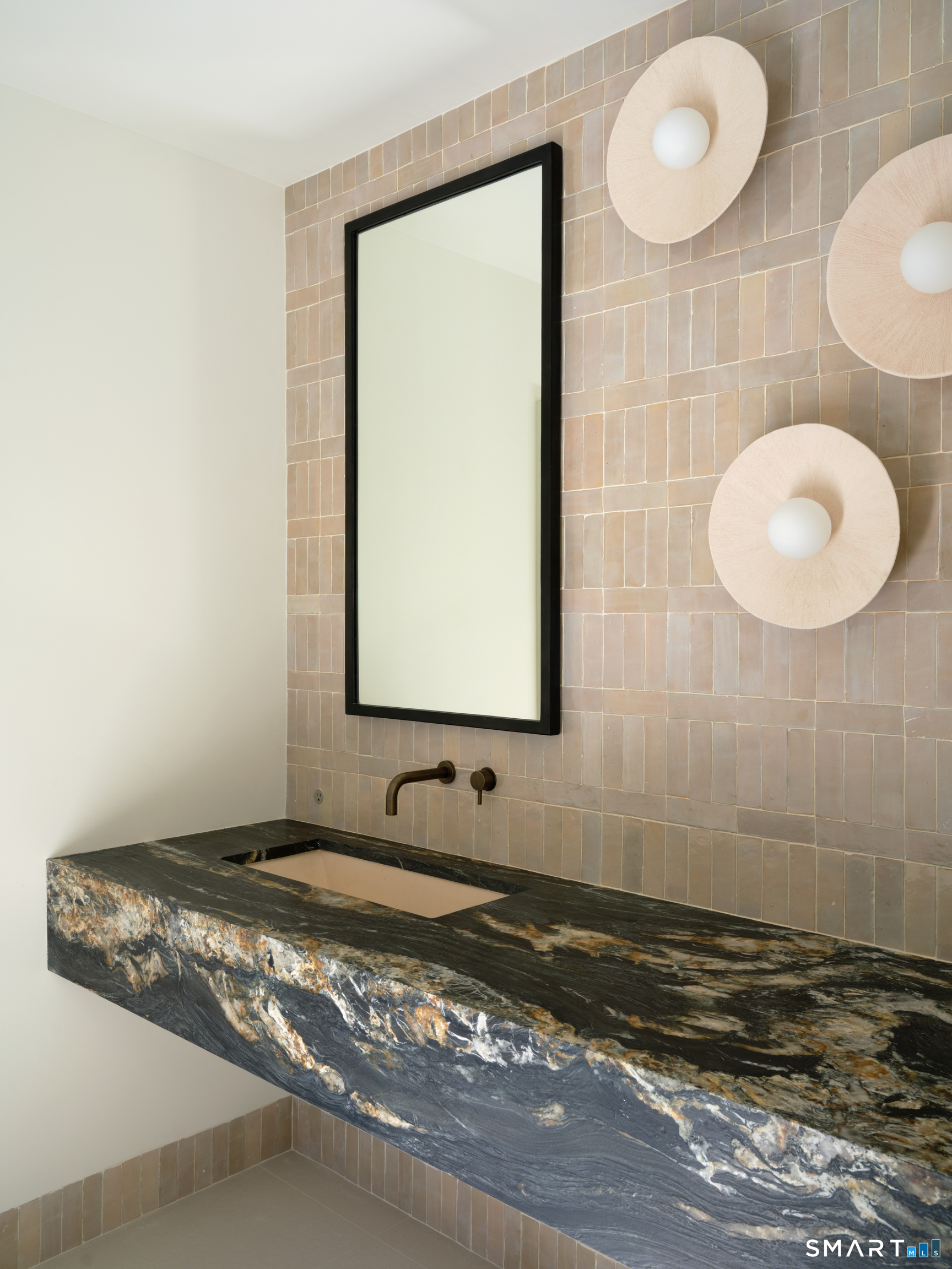 45 Old Farm Road Darien, CT 06820 - Photo 37 of 38 a bathroom with a sink and a mirror
