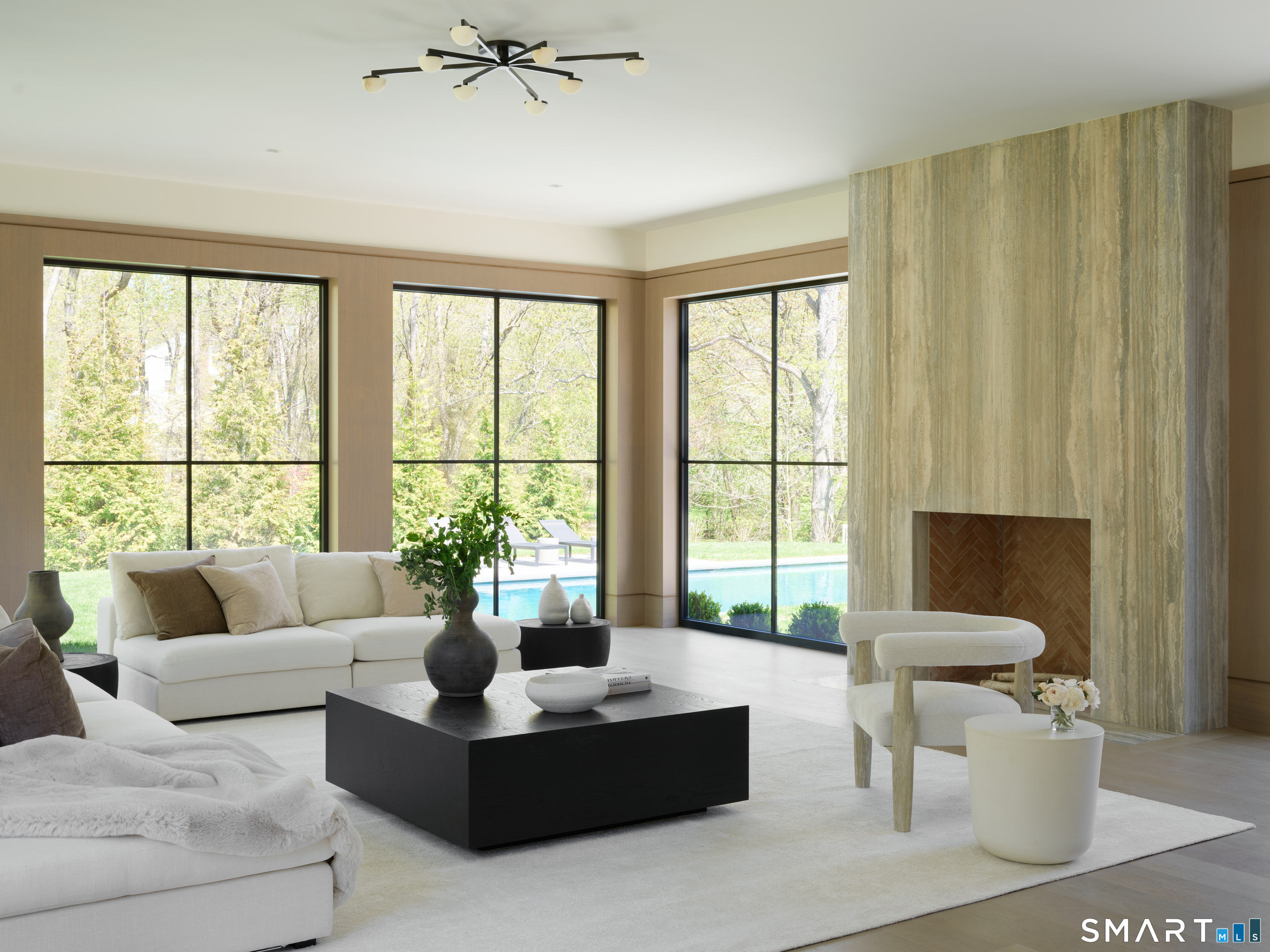 45 Old Farm Road Darien, CT 06820 - Photo 10 of 38 a living room with furniture and a large window