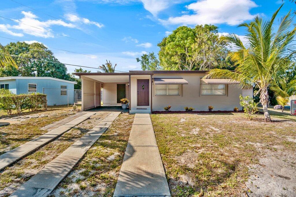 591 Oleander Road Lake Worth, FL 33462 - Photo 1 of 43 Front Exterior Close.jpg-SMALL