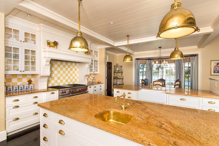 260 North Bay Road Osterville, MA 02655 - Photo 16 of 35 a room with counter top space a chandelier and large window