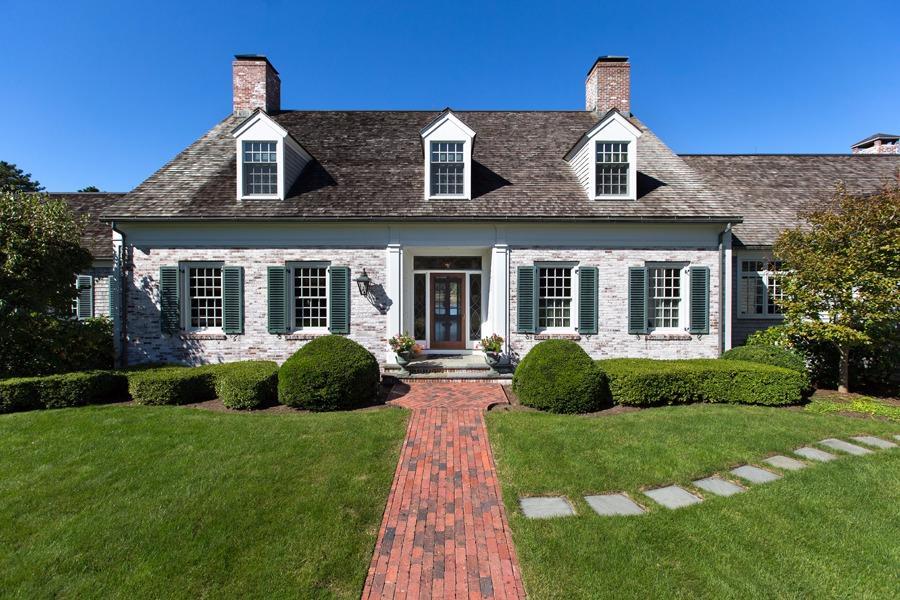 260 North Bay Road Osterville, MA 02655 - Photo 4 of 35 front view of a house with a yard