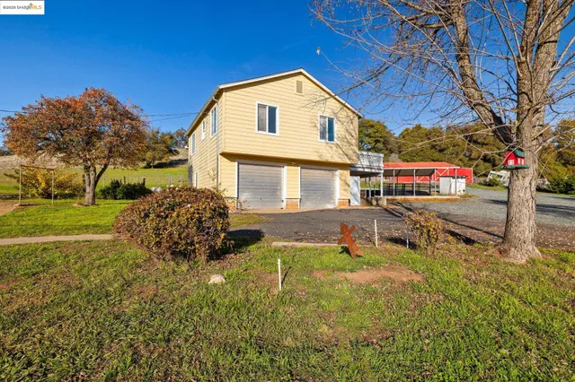 a house view with a outdoor space
