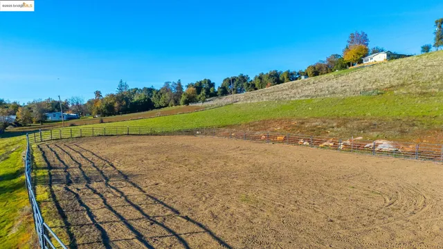 a view of a yard and an ocean