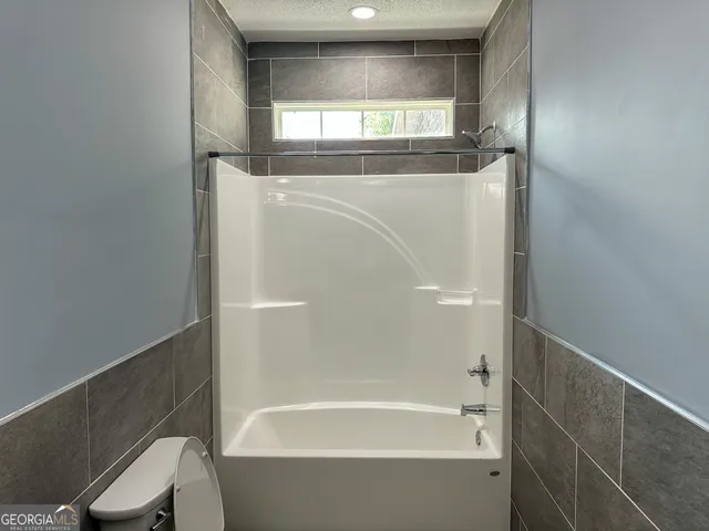 a bathroom with a bathtub
