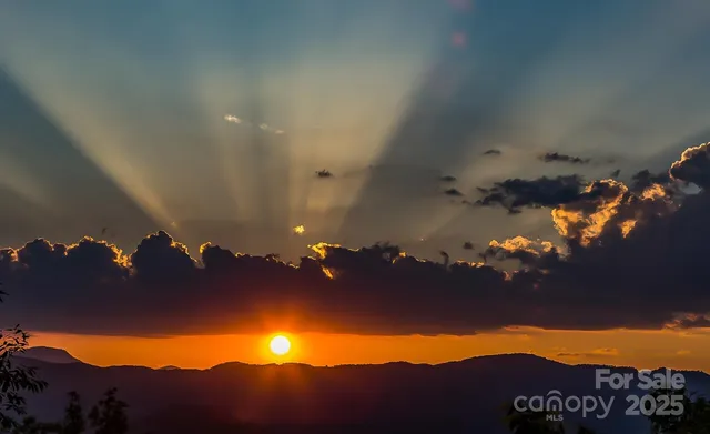 a view of ocean and mountain