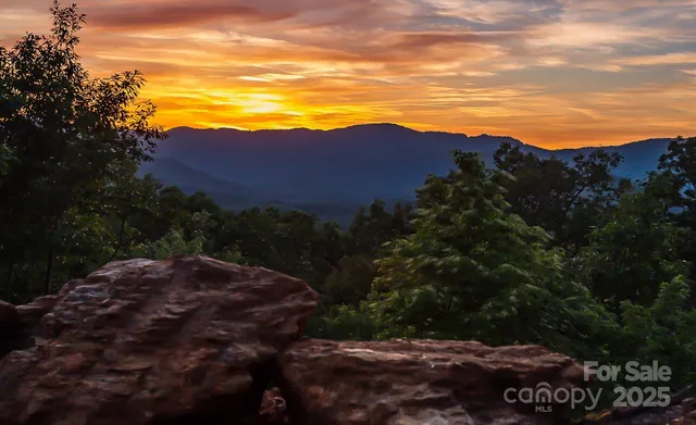 a view of a city with mountain