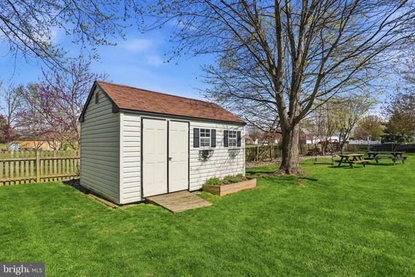 an aerial view of a house with outdoor space