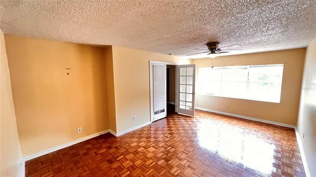 a view of an empty room and window