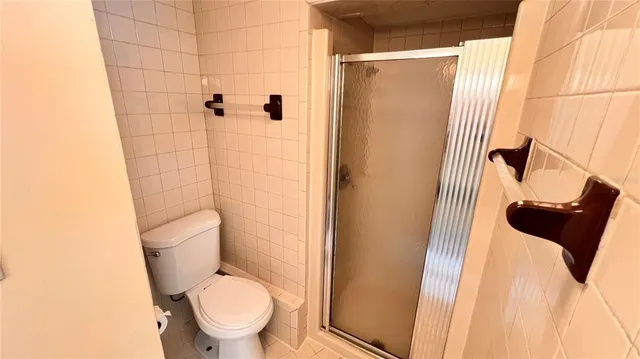 a view of washer and dryer in a bathroom