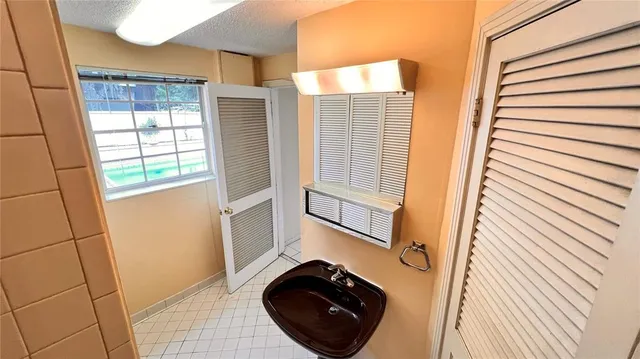 a view of an empty room and windows