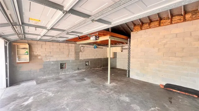 a swimming pool with some trees in the background