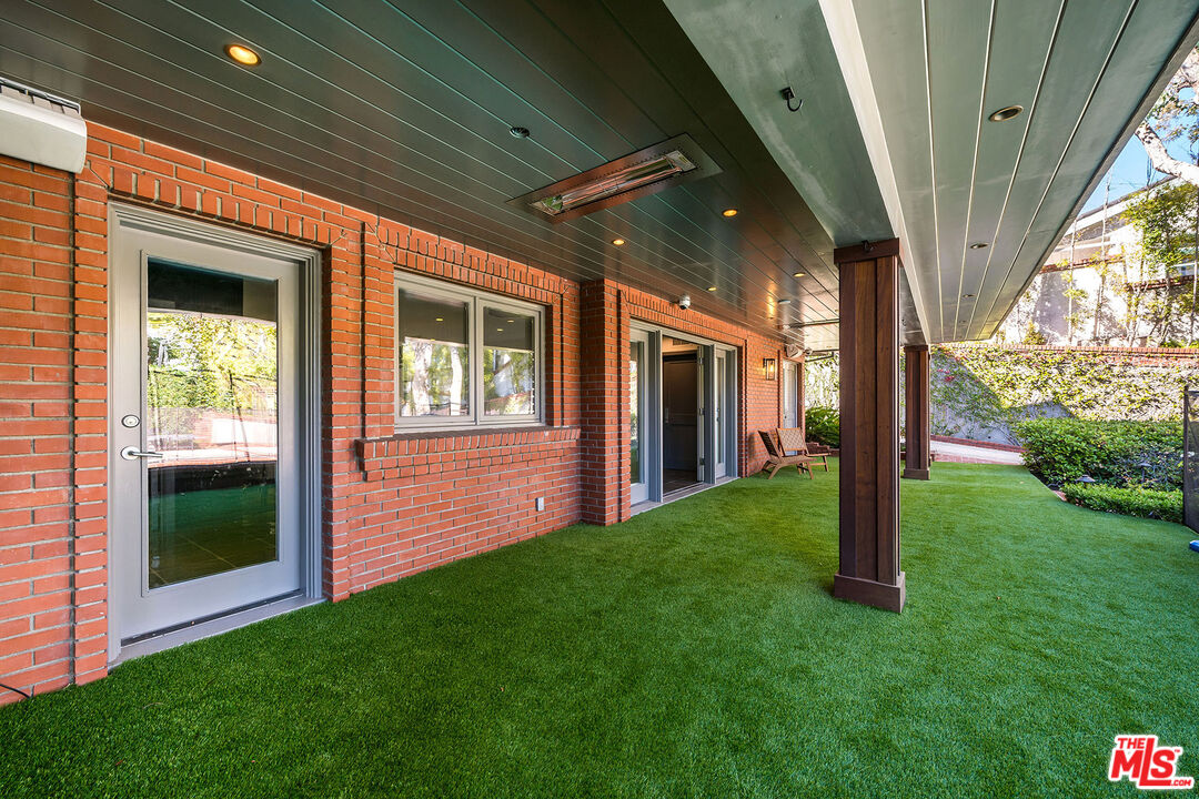 851 Glenmont Avenue Los Angeles, CA 90024 - Photo 23 of 26 a view of an entryway of house with backyard
