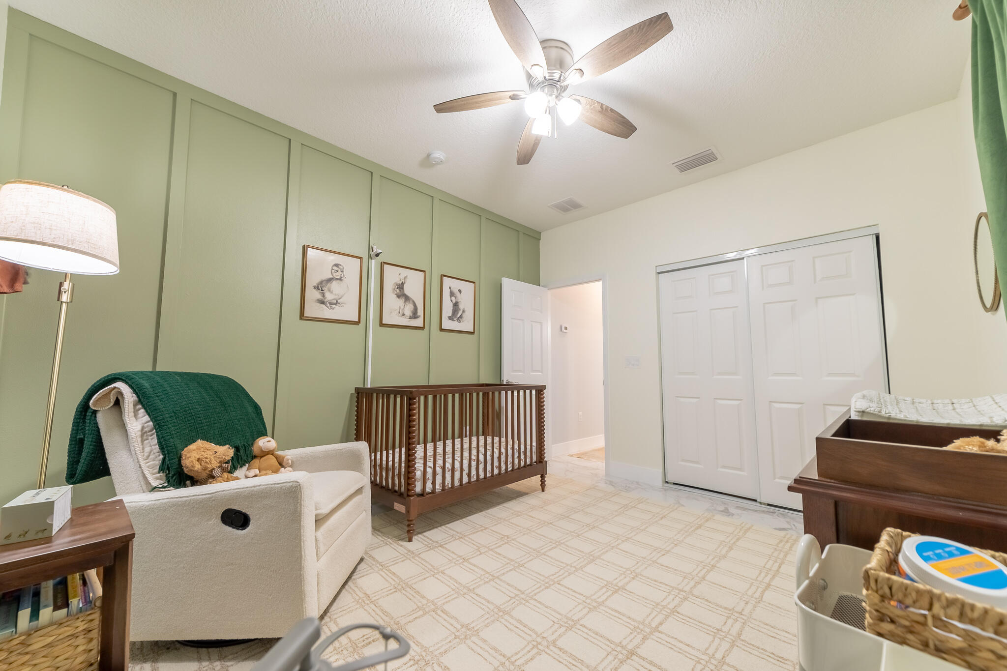 8640 Southwest 7th Lane Okeechobee, FL 34974 - Photo 18 of 52 a bedroom with furniture and a window