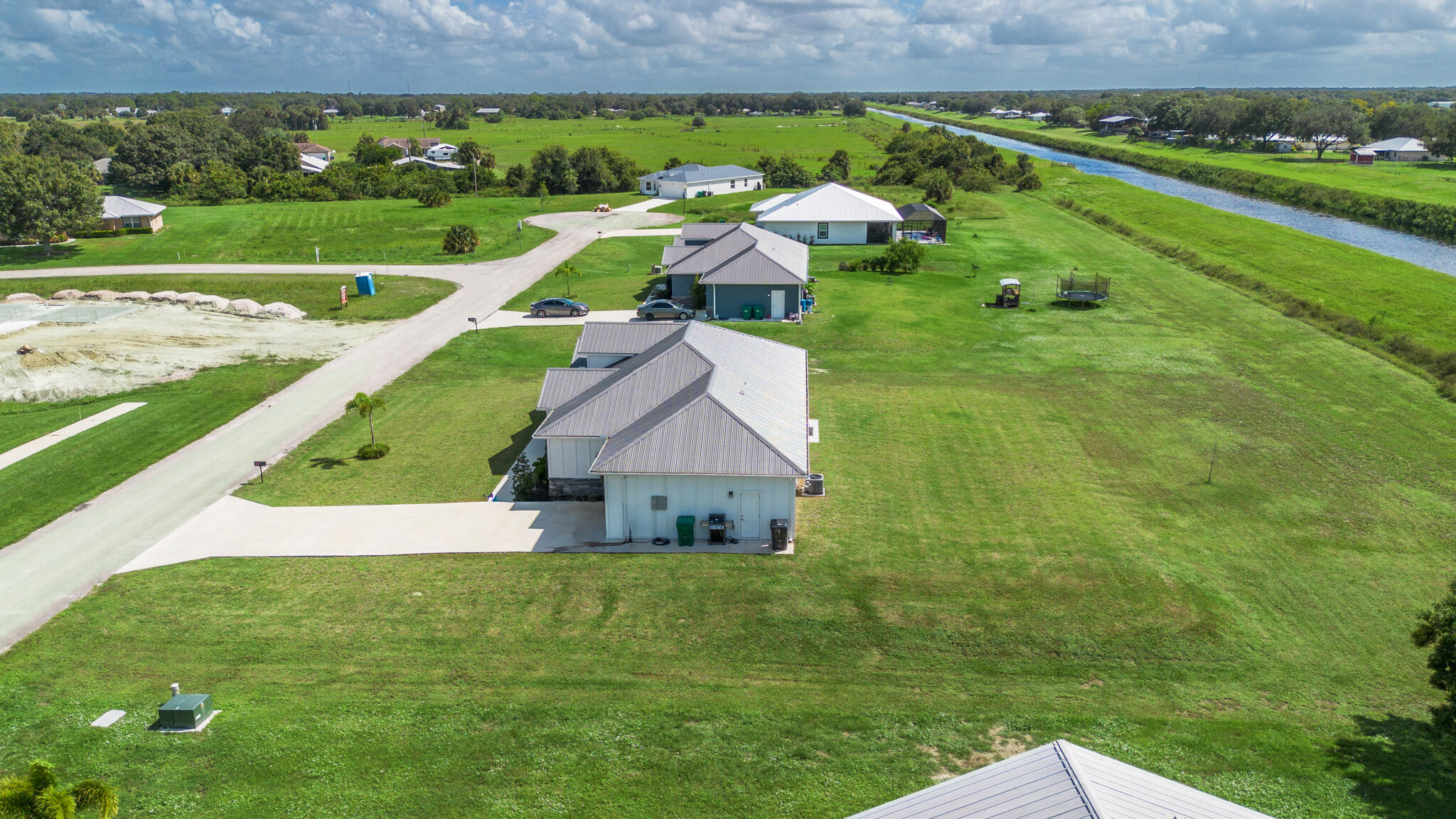 8640 Southwest 7th Lane Okeechobee, FL 34974 - Photo 46 of 52 an aerial view of a house with a garden