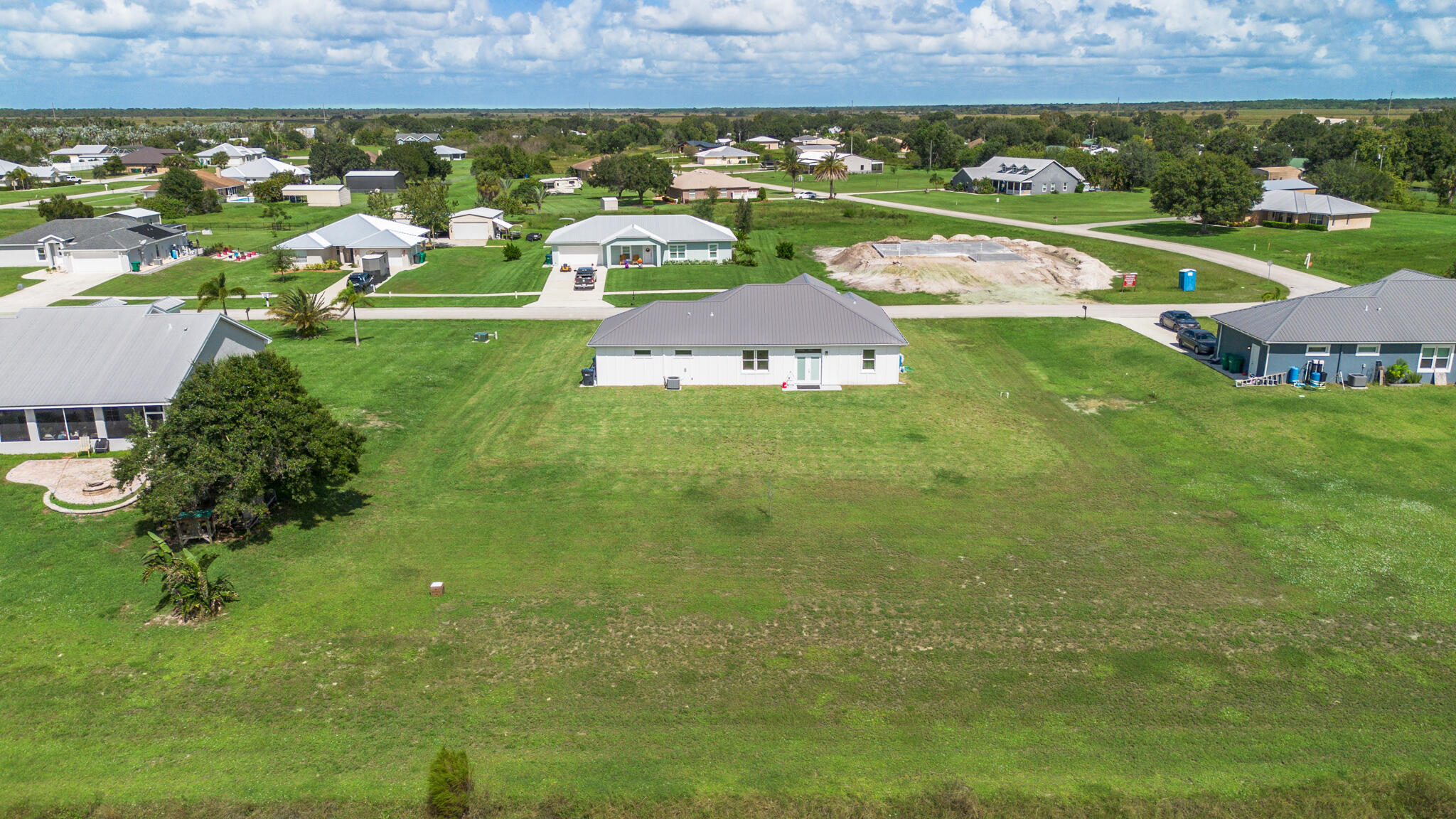 8640 Southwest 7th Lane Okeechobee, FL 34974 - Photo 48 of 52 an aerial view of a house with a garden