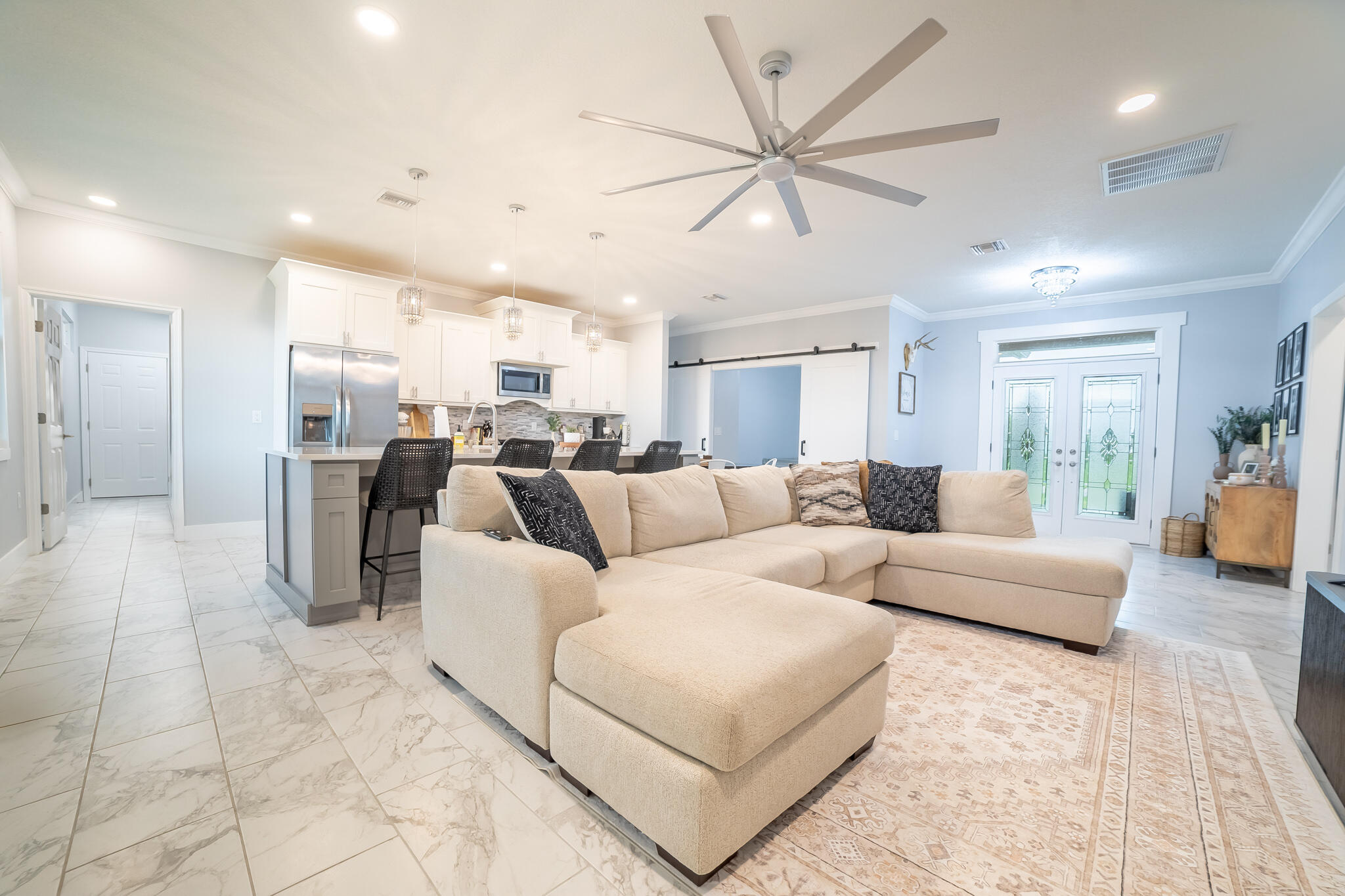 8640 Southwest 7th Lane Okeechobee, FL 34974 - Photo 6 of 52 a living room with furniture and a view of kitchen