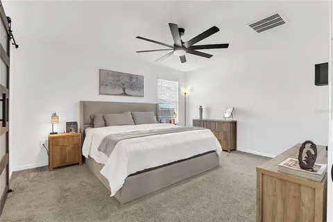 a bedroom with a bed and closet