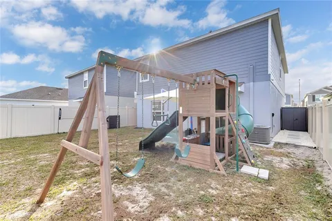 a view of a house with a park