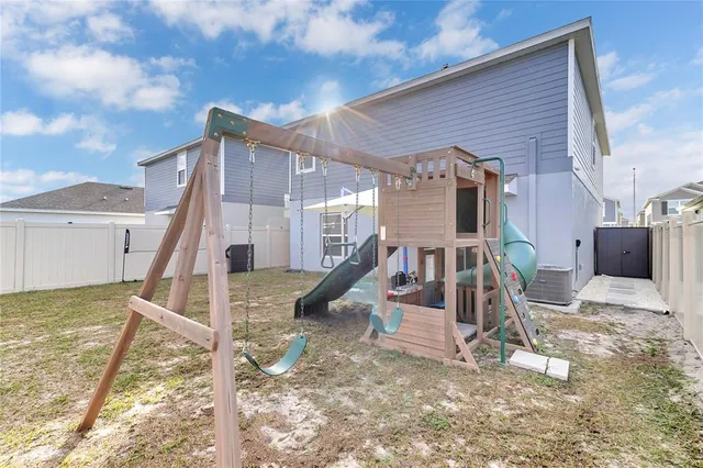 a view of a house with a park