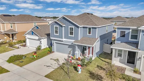 a view of house with a garden