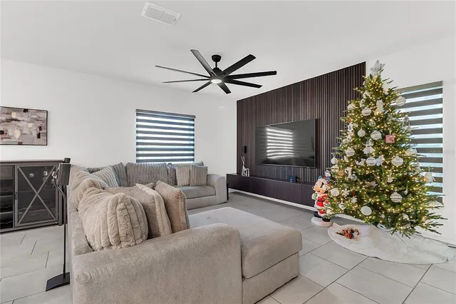 a bedroom with bed and a window