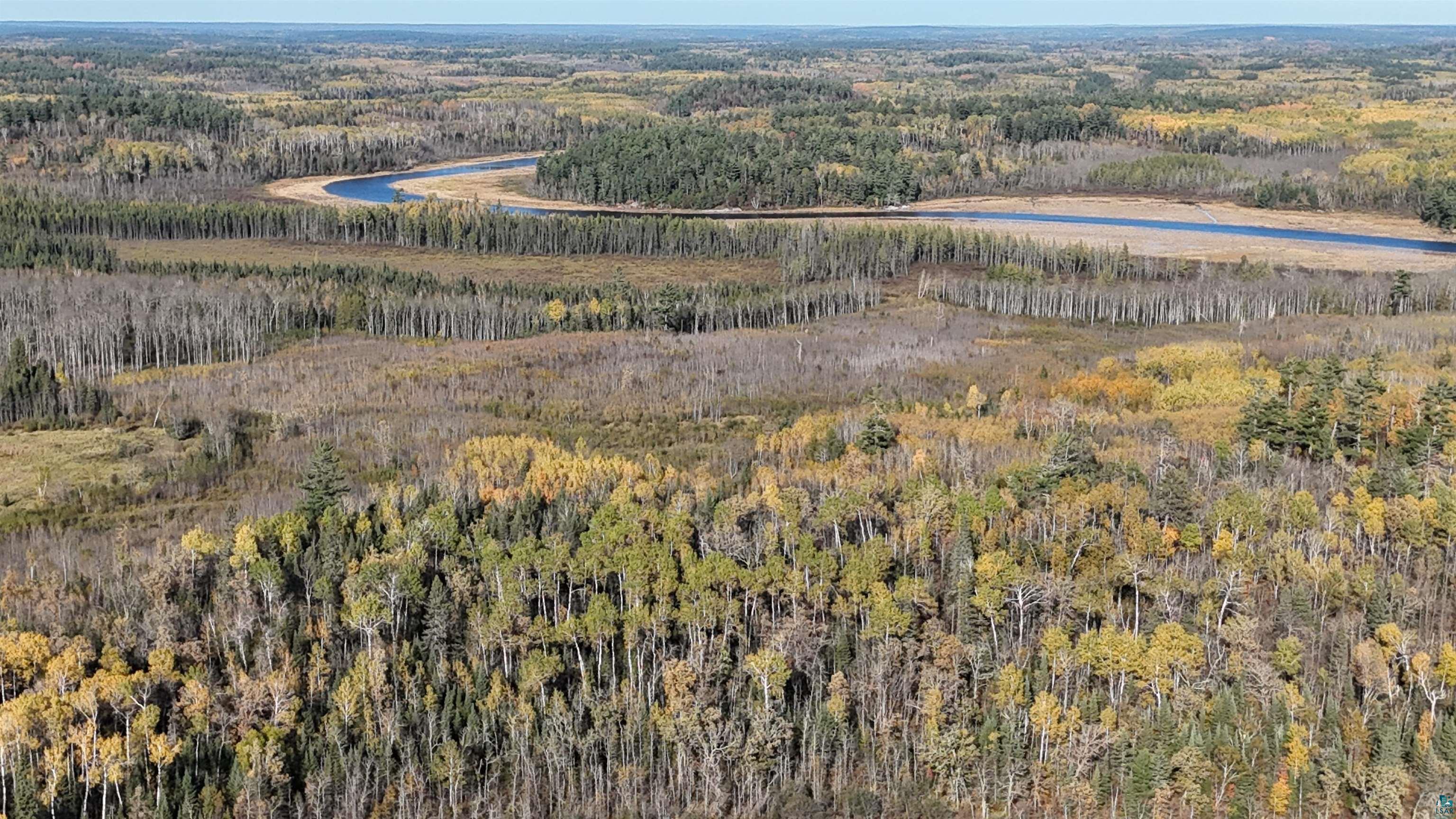 7178 Gold Mine Road Orr, MN 55771 - Photo 36 of 36 Aerial view of property's location with a heavily wooded area and a large body of water