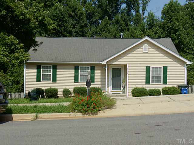 2315 Springhill Avenue Raleigh, NC 27603 - Photo 15 of 15 a front view of a house with a yard