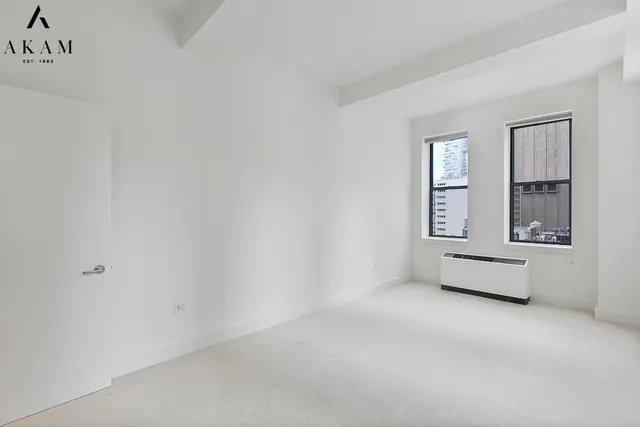 an empty room with windows