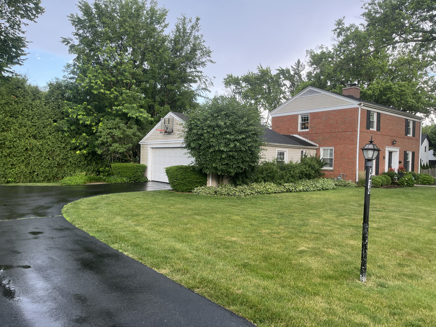 2430 Covert Road Glenview, IL 60025 - Photo 20 of 26 a front view of a house with garden