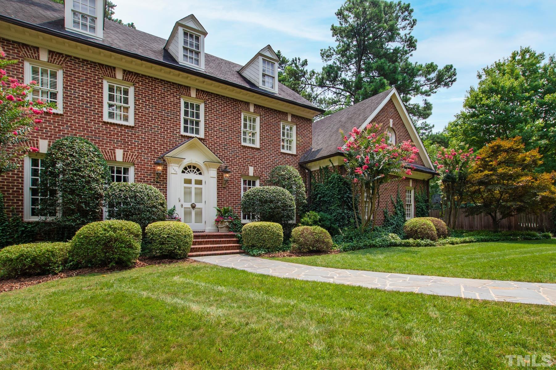 1430 Chester Road Raleigh, NC 27608 - Photo 2 of 39 a front view of a house with garden