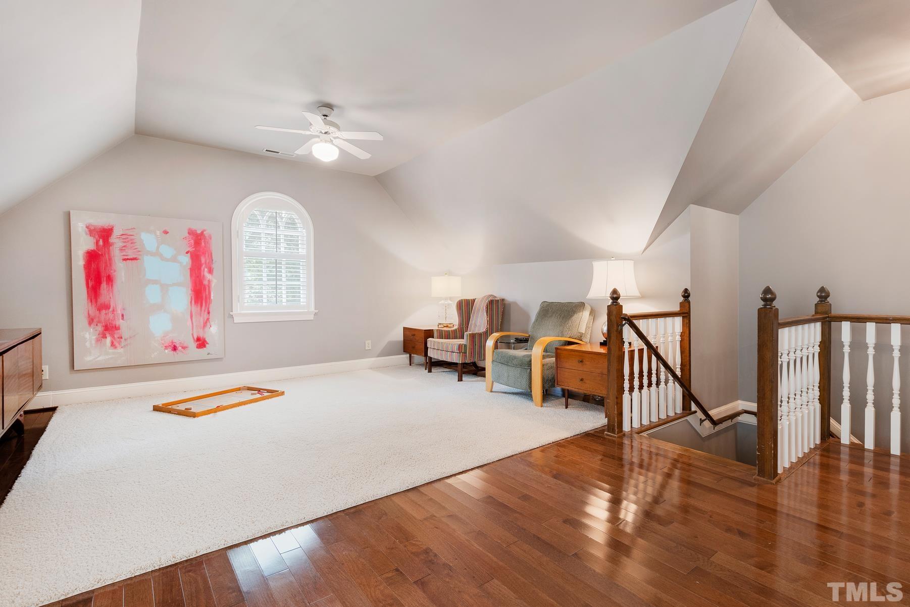 1430 Chester Road Raleigh, NC 27608 - Photo 26 of 39 a living room with furniture and a flat screen tv