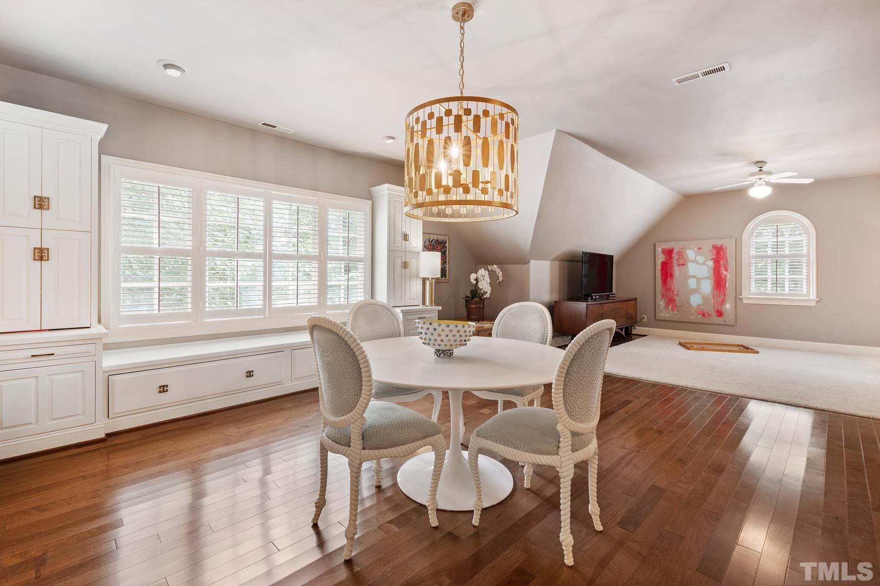 1430 Chester Road Raleigh, NC 27608 - Photo 28 of 39 a view of a dining room with furniture window and wooden floor