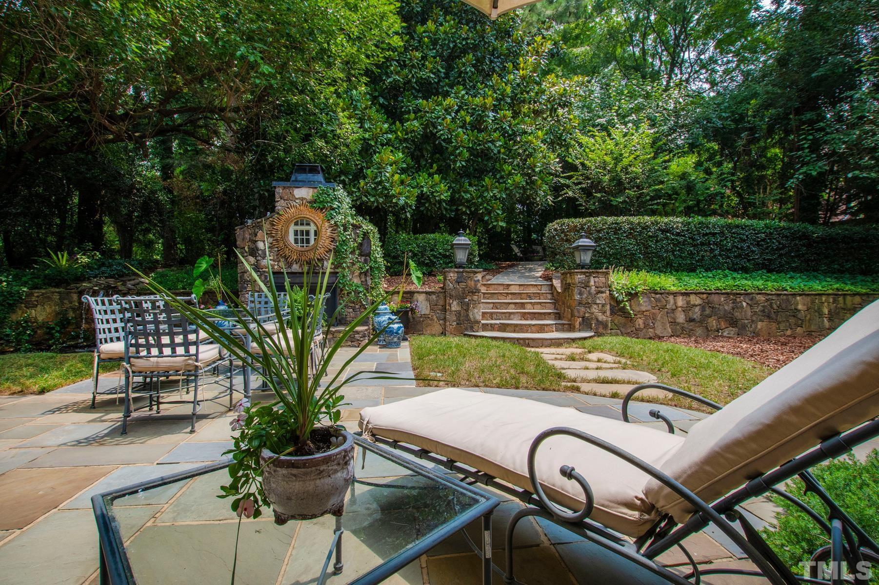 1430 Chester Road Raleigh, NC 27608 - Photo 33 of 39 a view of a backyard with sitting area