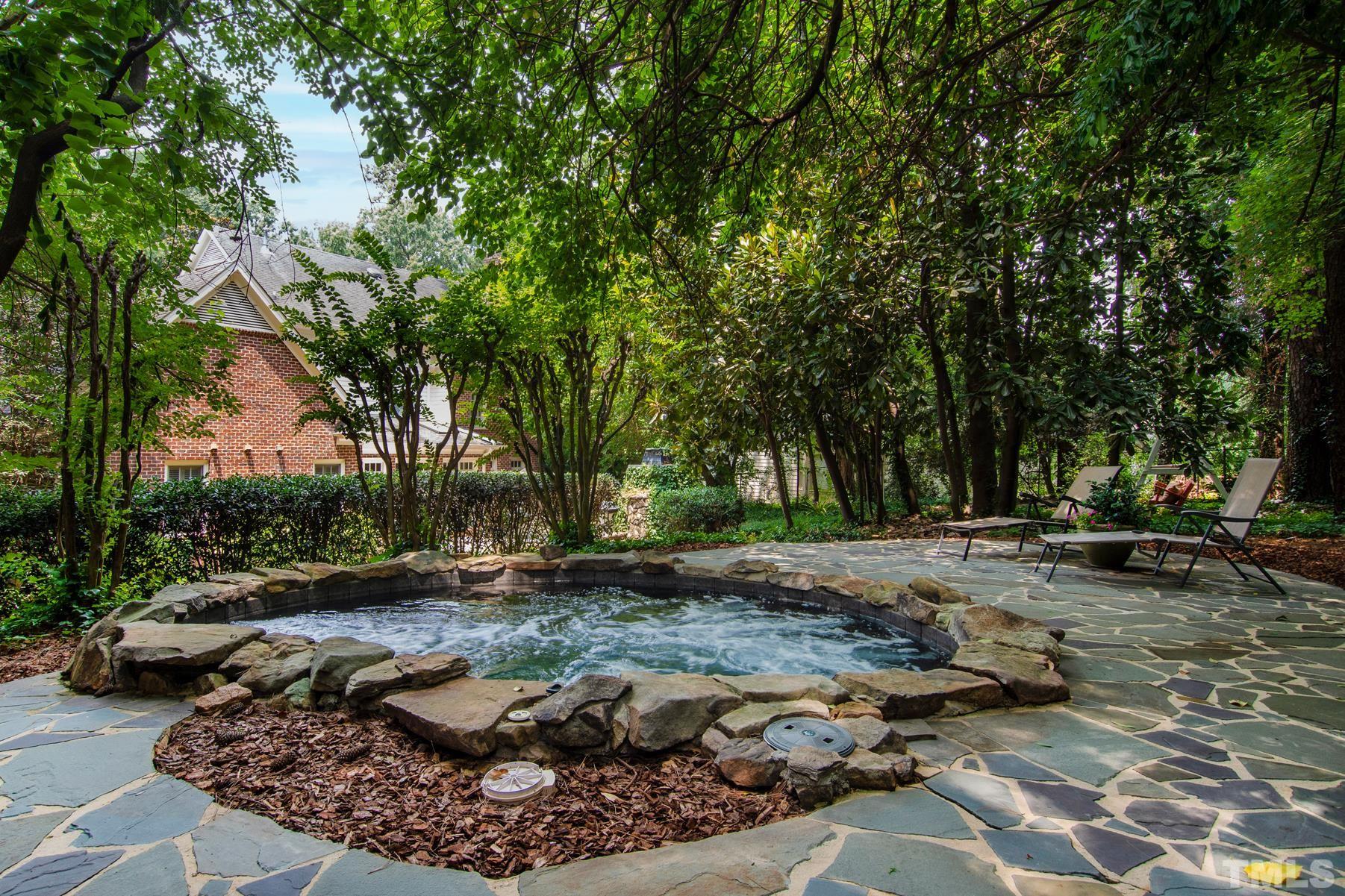 1430 Chester Road Raleigh, NC 27608 - Photo 35 of 39 a view of a backyard with large trees