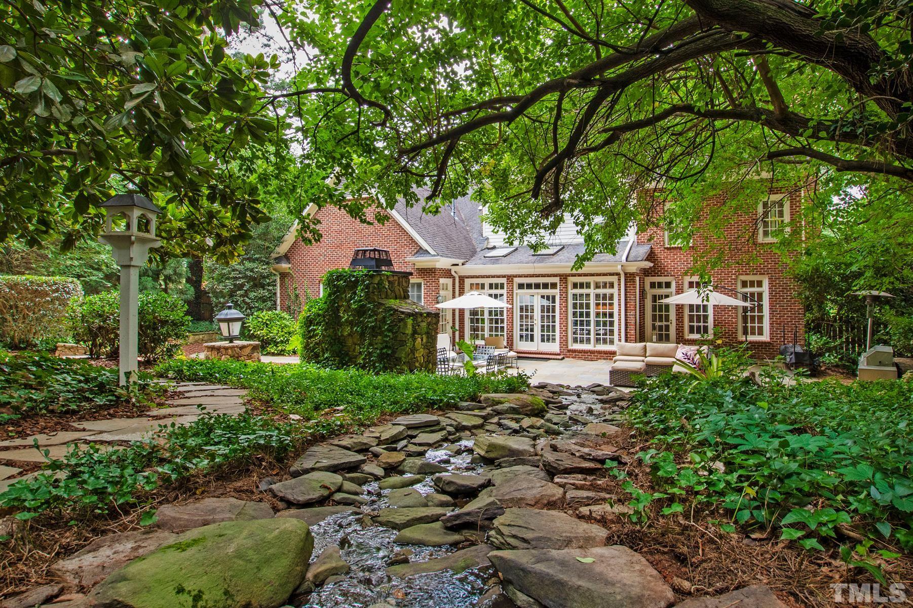 1430 Chester Road Raleigh, NC 27608 - Photo 36 of 39 a front view of a house with garden