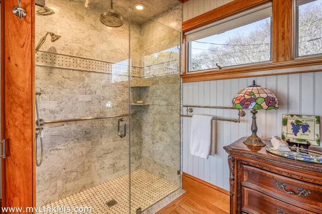 a bathroom with a sink and mirror