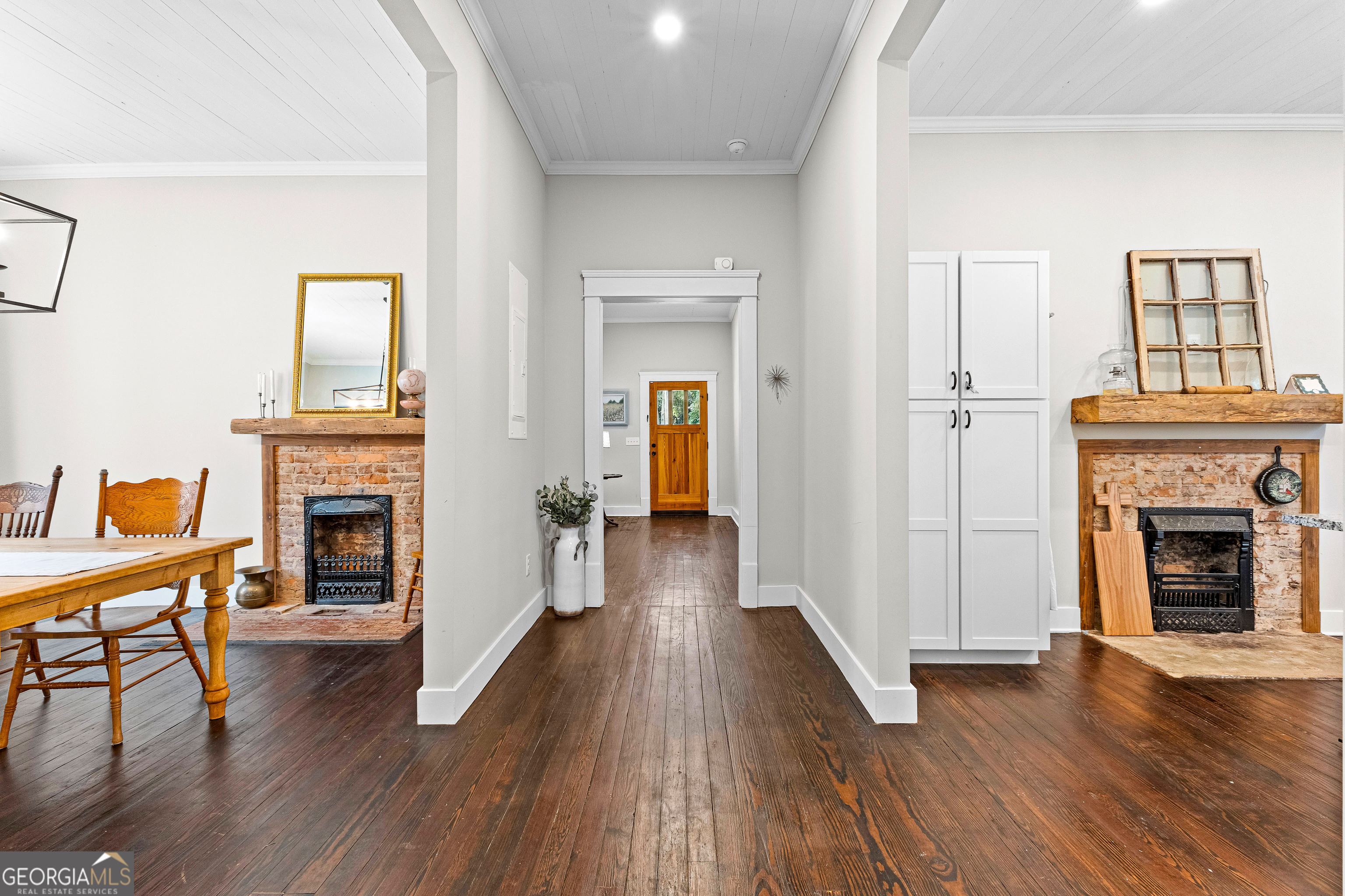 96 Griffin Street Grantville, GA 30220 - Photo 21 of 63 a view of a livingroom with wooden floor and a fireplace
