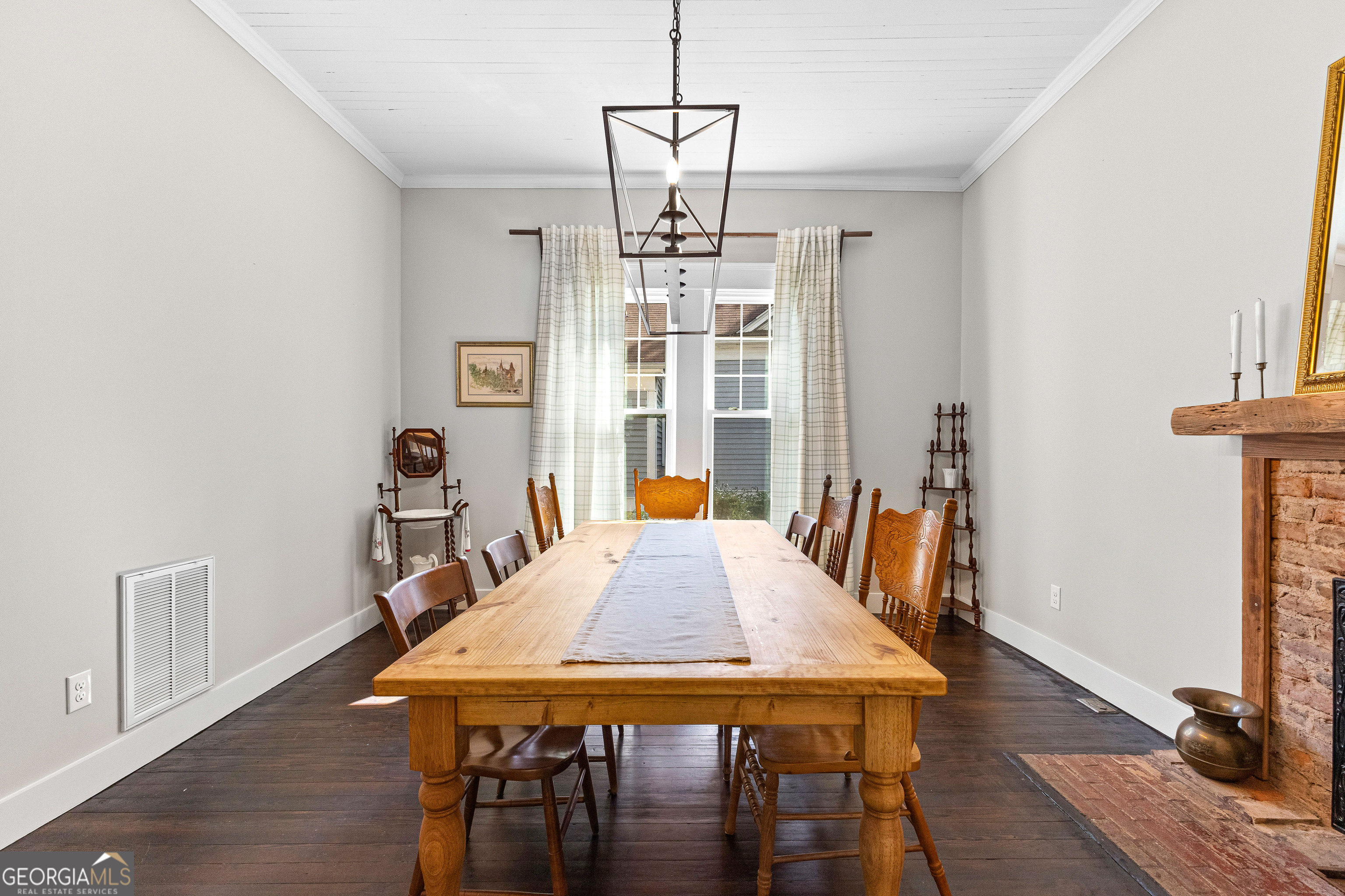 96 Griffin Street Grantville, GA 30220 - Photo 22 of 63 a view of a dining room with furniture window and wooden floor