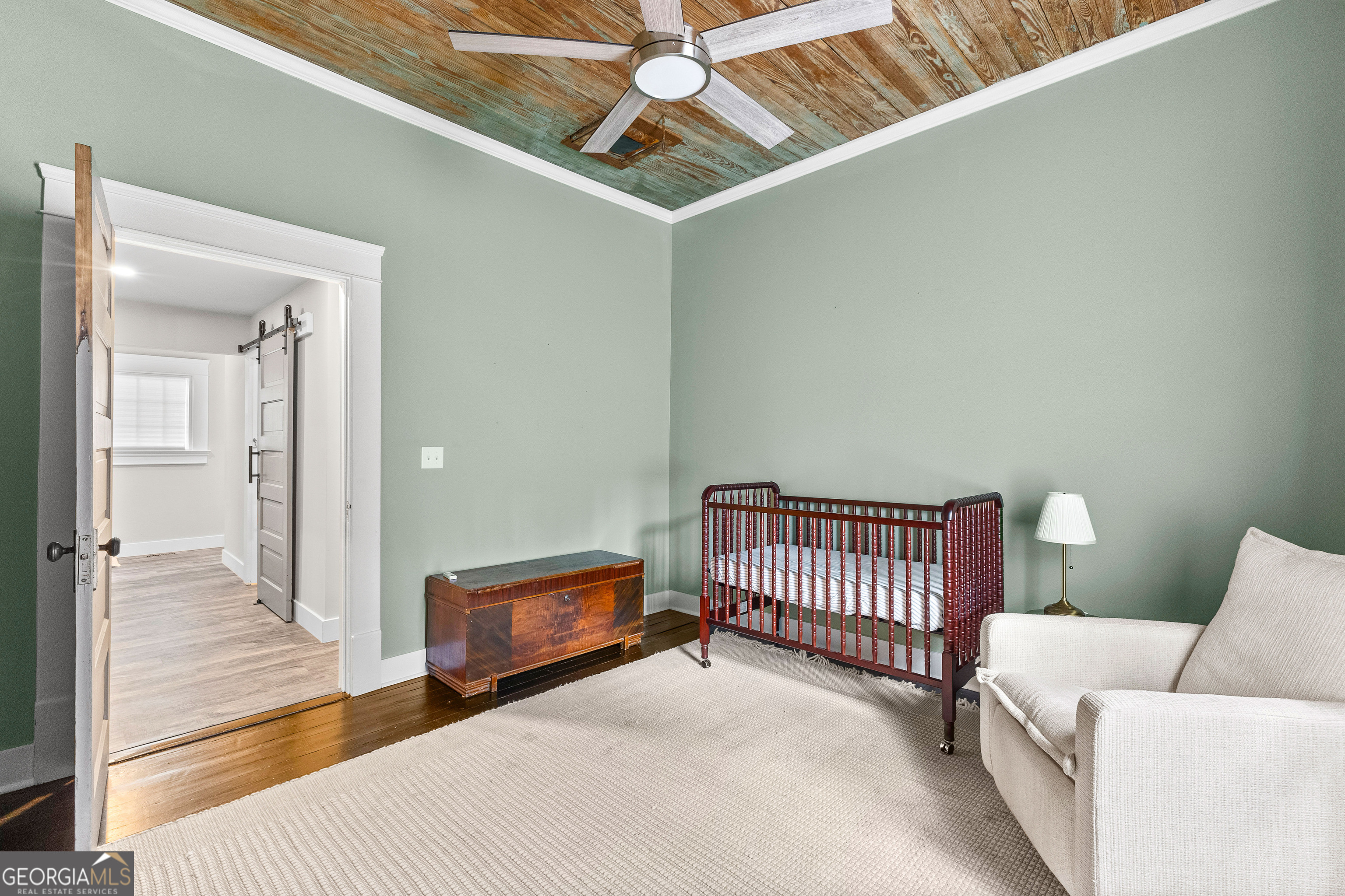 96 Griffin Street Grantville, GA 30220 - Photo 38 of 63 a bedroom with a bed and a couch