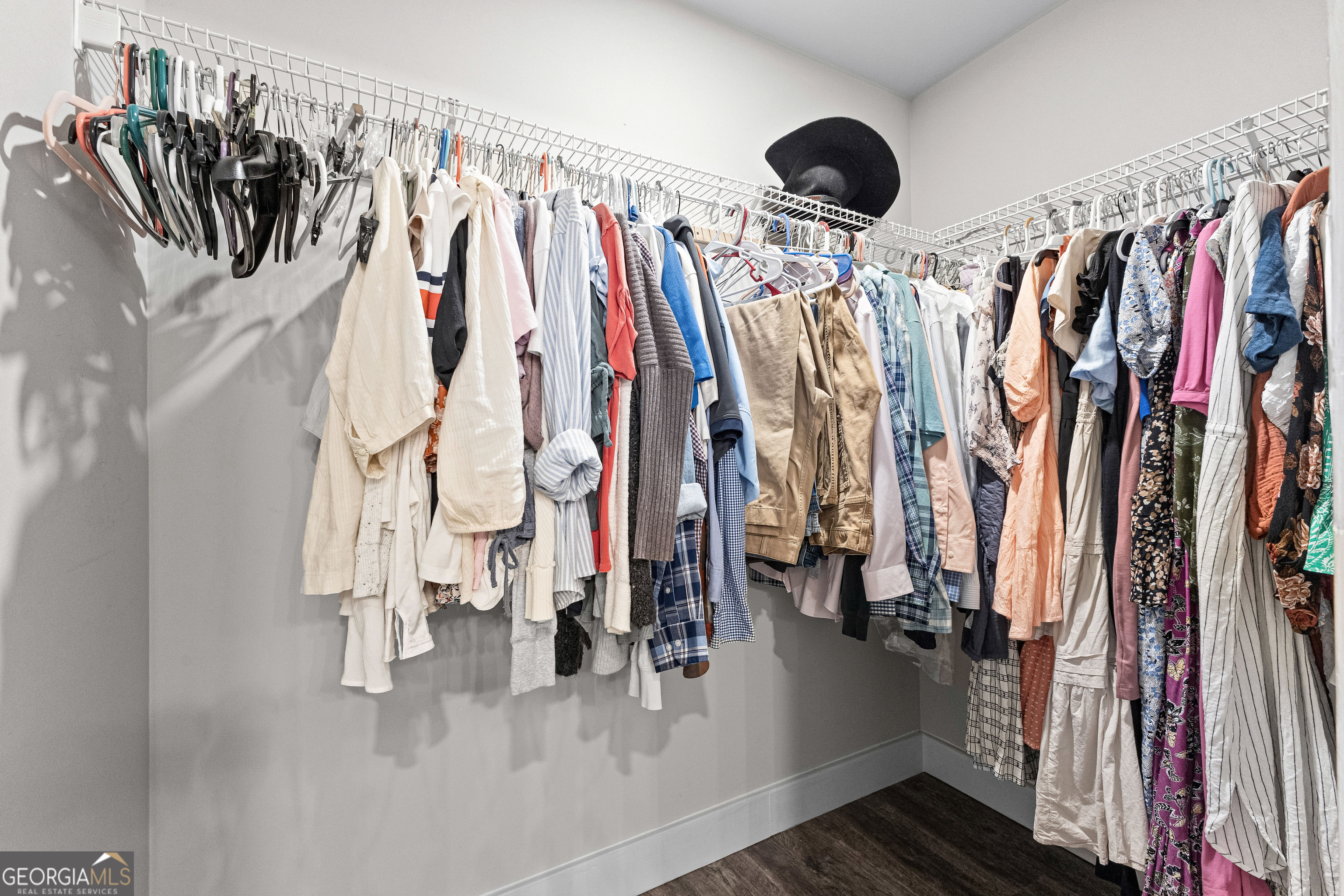 96 Griffin Street Grantville, GA 30220 - Photo 49 of 63 a view of walk in closet with clothes and shoes
