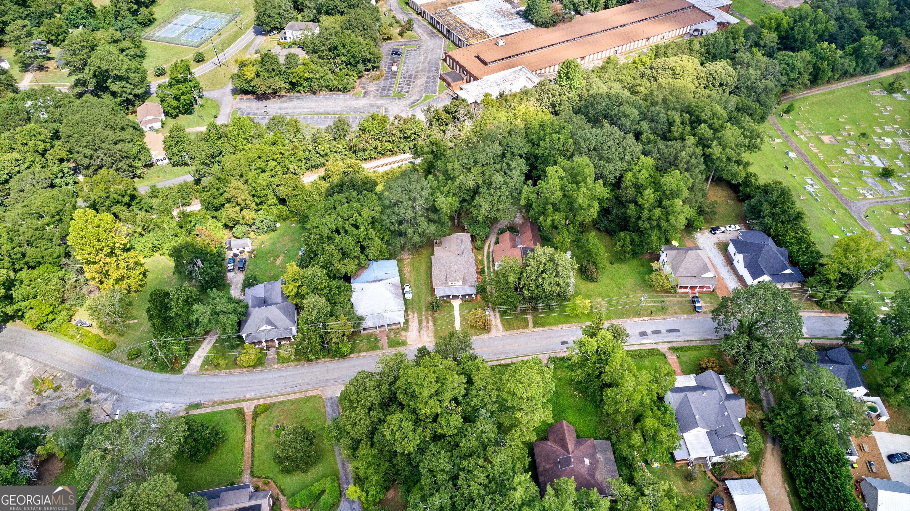 96 Griffin Street Grantville, GA 30220 - Photo 60 of 63 an aerial view of house with swimming pool outdoor seating and yard