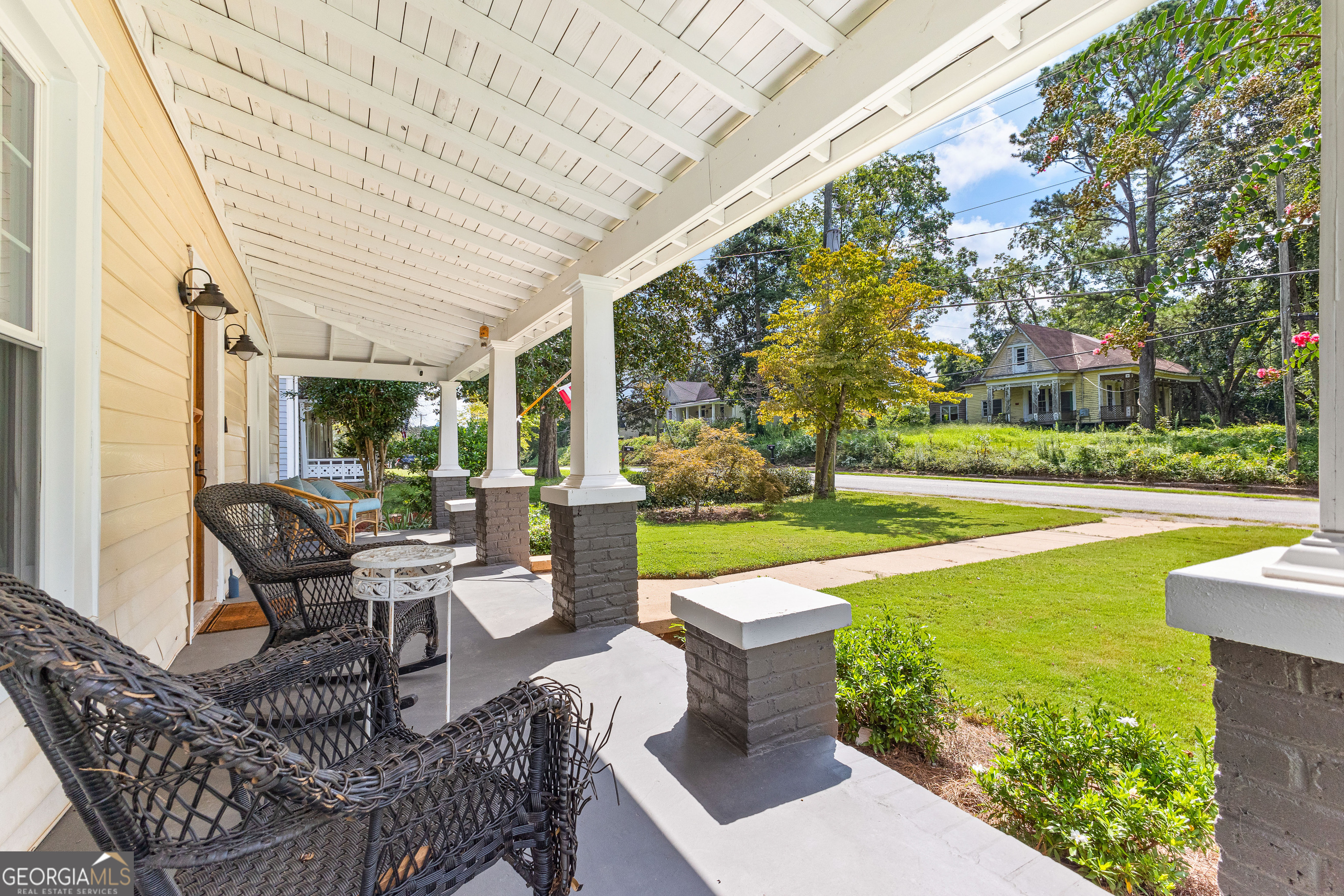 96 Griffin Street Grantville, GA 30220 - Photo 7 of 63 a building outdoor space with patio entrance and wooden floor