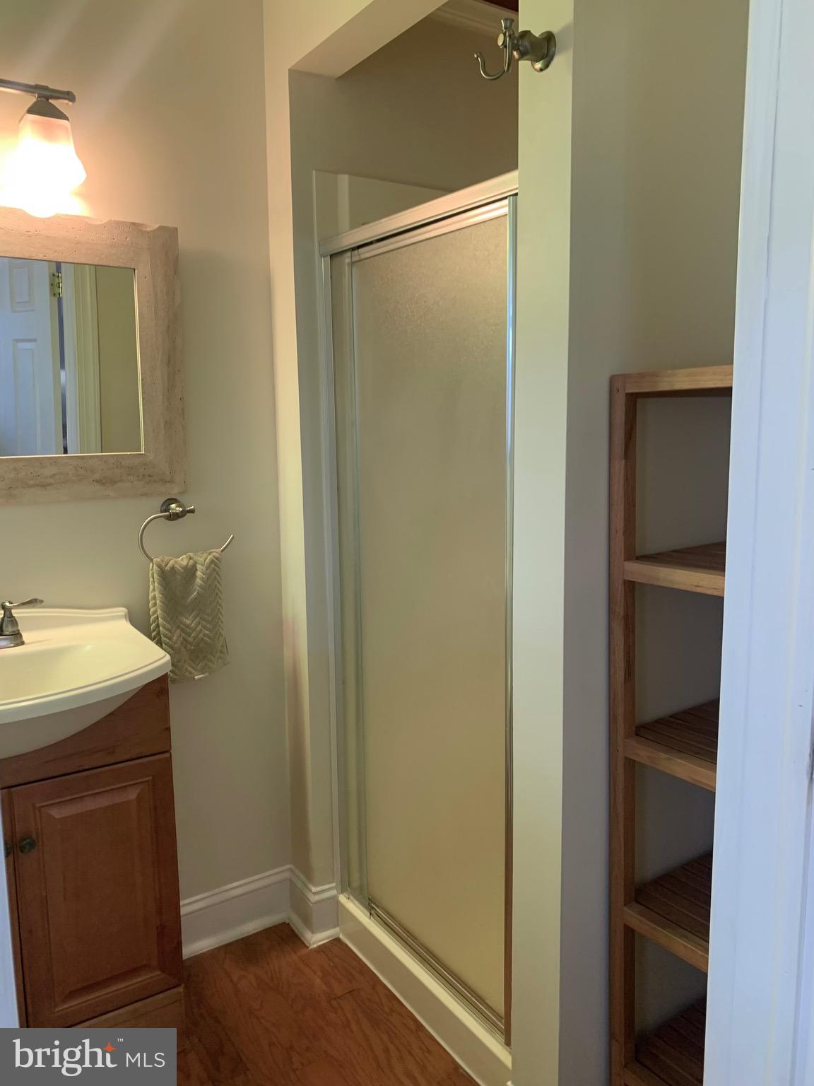 119 Grandview Avenue Pitman, NJ 08071 - Photo 19 of 28 a bathroom with a sink and mirror