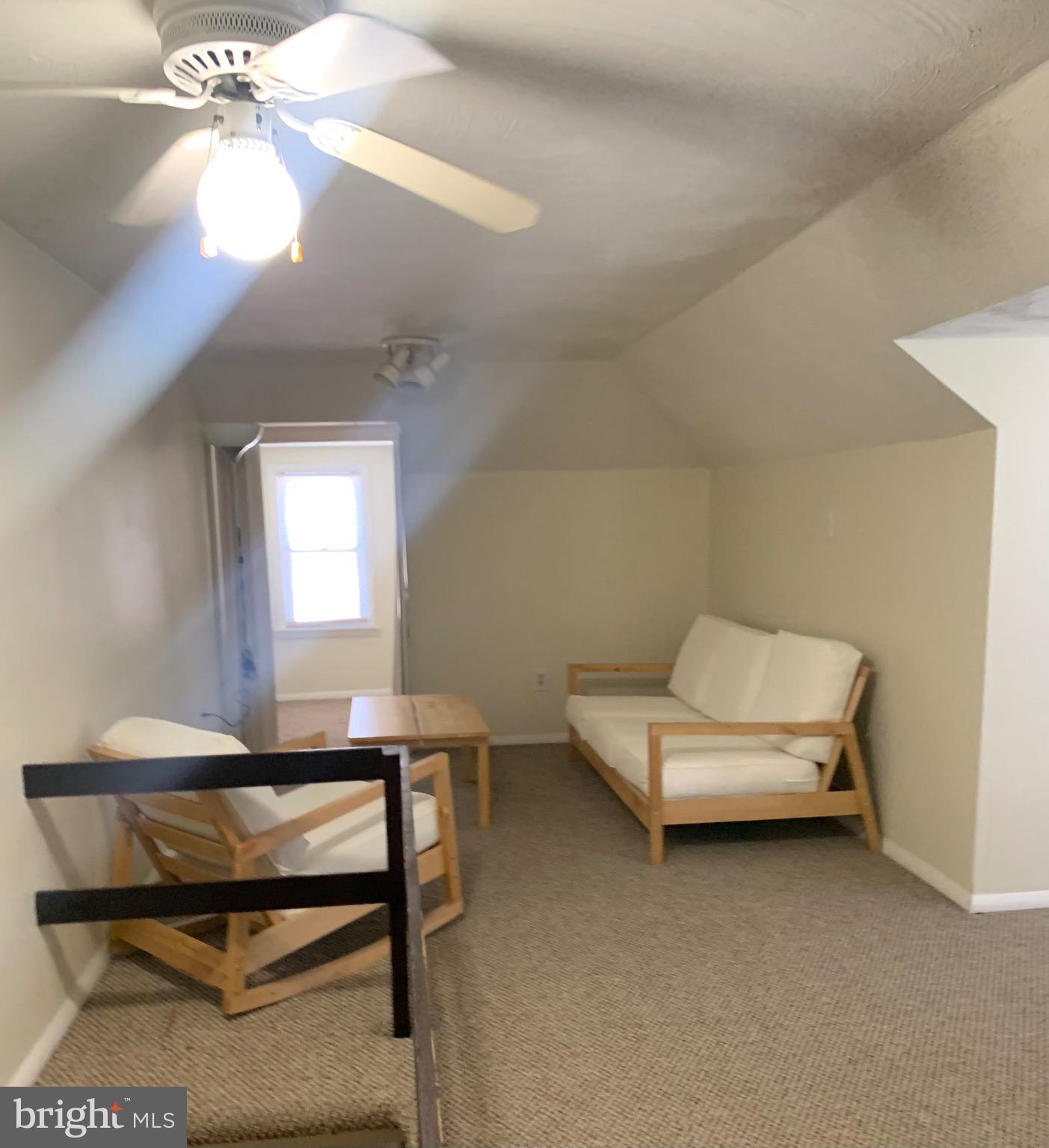 119 Grandview Avenue Pitman, NJ 08071 - Photo 24 of 28 a living room with furniture and a window