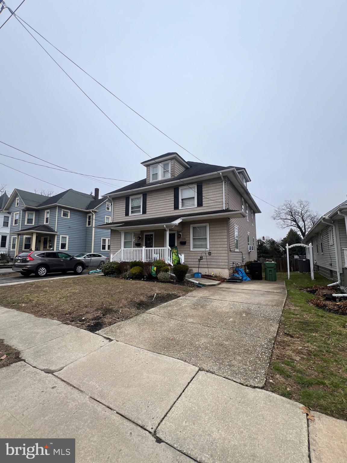 119 Grandview Avenue Pitman, NJ 08071 - Photo 6 of 28 a front view of a house with a yard and garage
