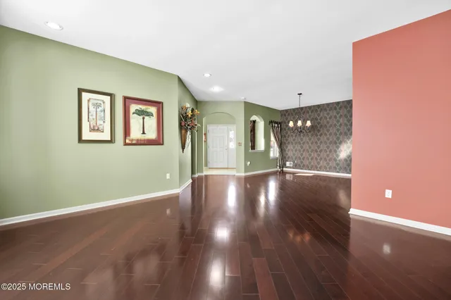 a view of a livingroom with wooden floor