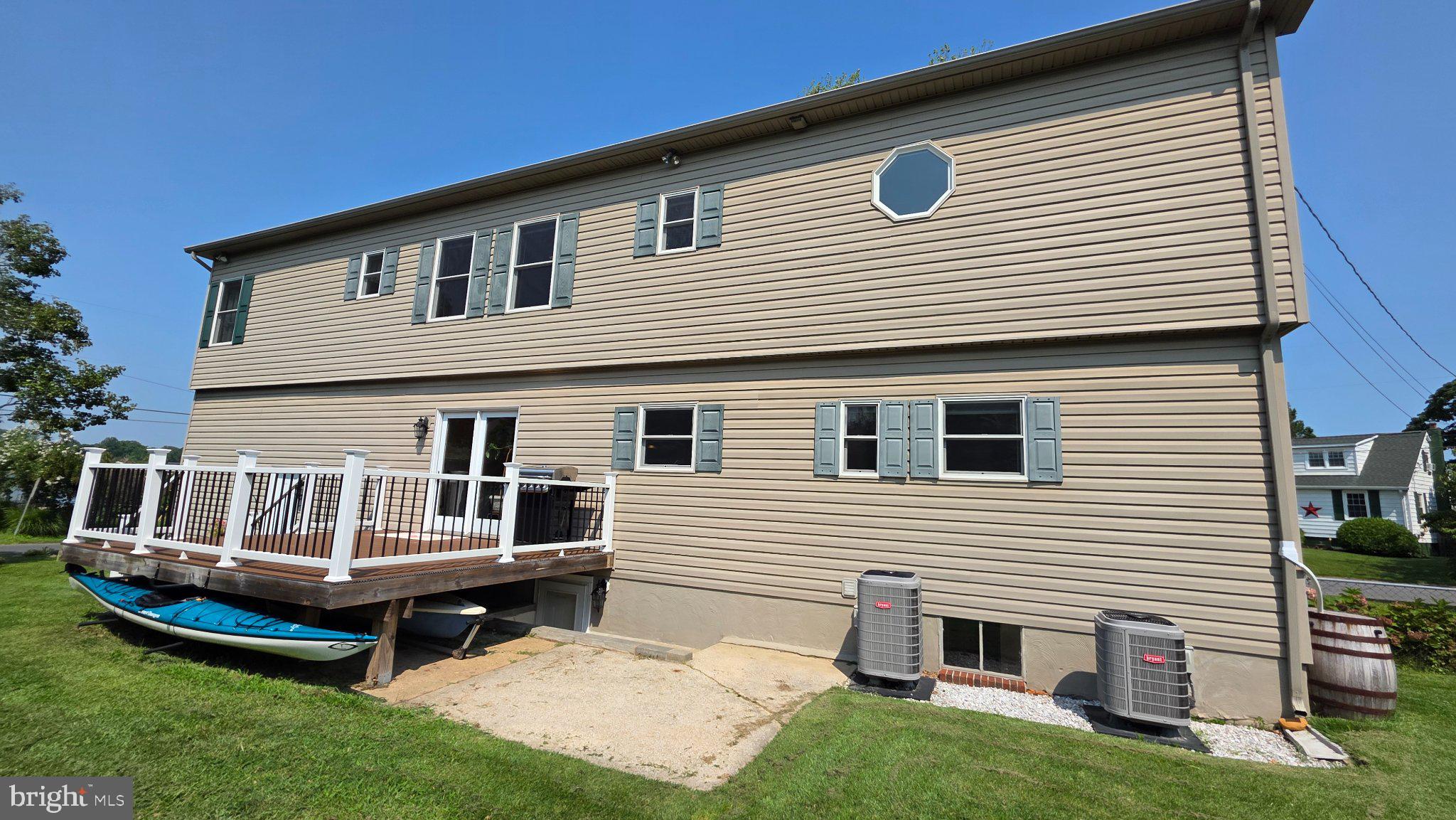 8418 Geneva Road Pasadena, MD 21122 - Photo 45 of 53 Rear of the home with inviting deck space.