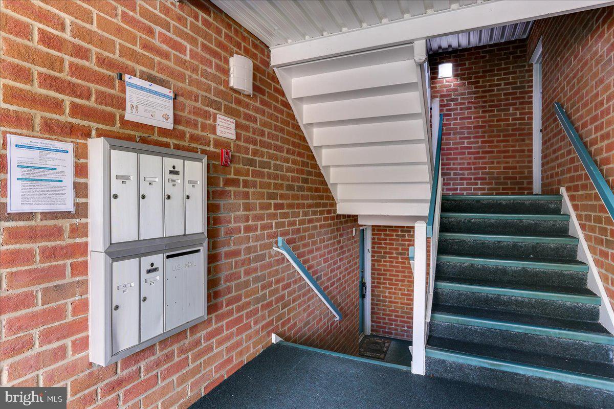 11823 Breton Court, Unit 2B Reston, VA 20191 - Photo 3 of 21 a view of entryway with staircase
